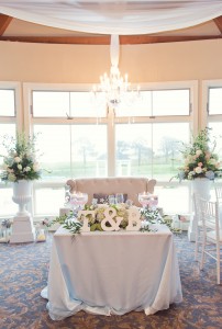 bride and groom wedding table with flowers