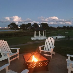 bonfire on patio outside by gazebo